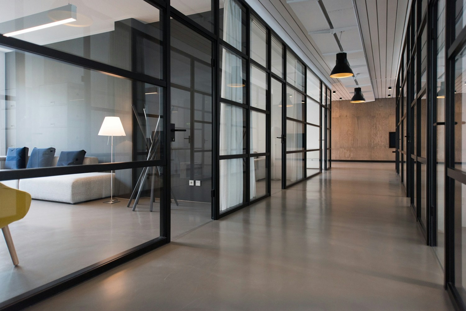 A bright workspace with a communal table and natural light